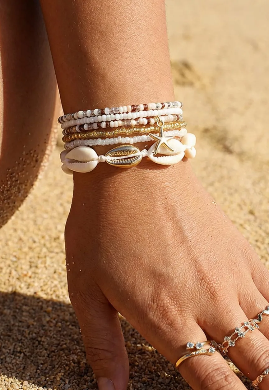 Armbandenset met Kauri Schelpjes en Zeester Bedeltje