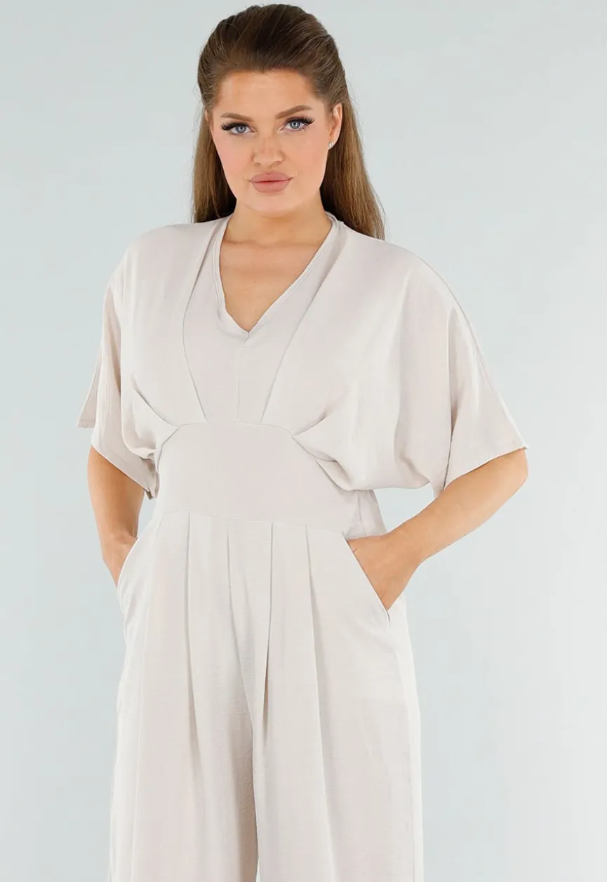 Beige Linnenlook Jumpsuit met Wijde Pijpen en Lage V-Hals