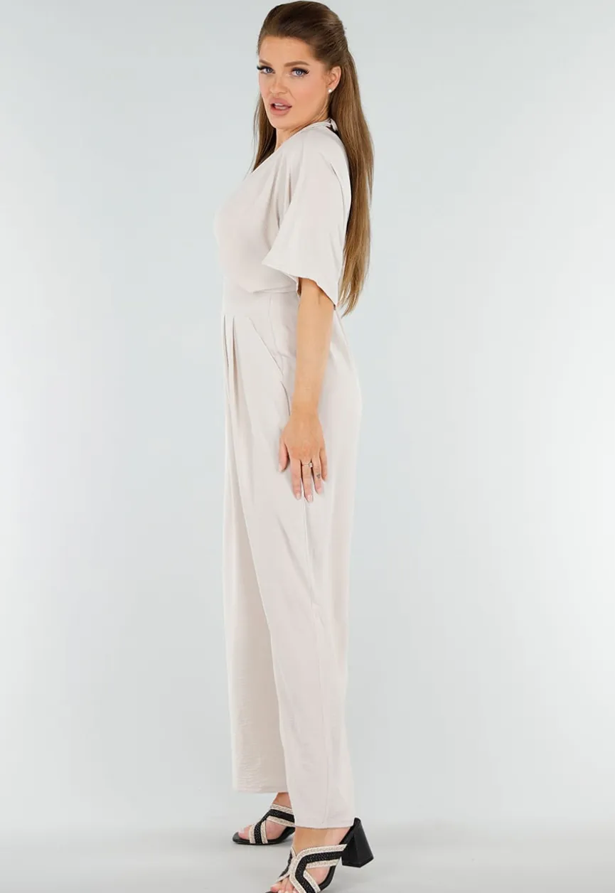 Beige Linnenlook Jumpsuit met Wijde Pijpen en Lage V-Hals