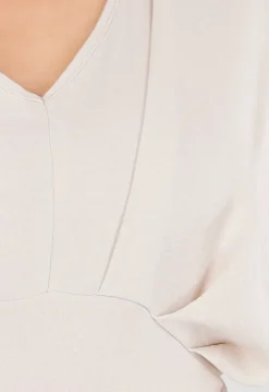 Beige Linnenlook Jumpsuit met Wijde Pijpen en Lage V-Hals
