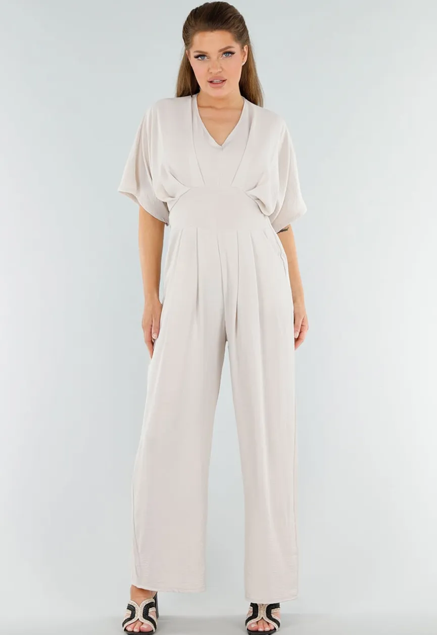 Beige Linnenlook Jumpsuit met Wijde Pijpen en Lage V-Hals