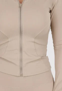 Beige Sportset met Strakke Fit en Ritssluiting Top