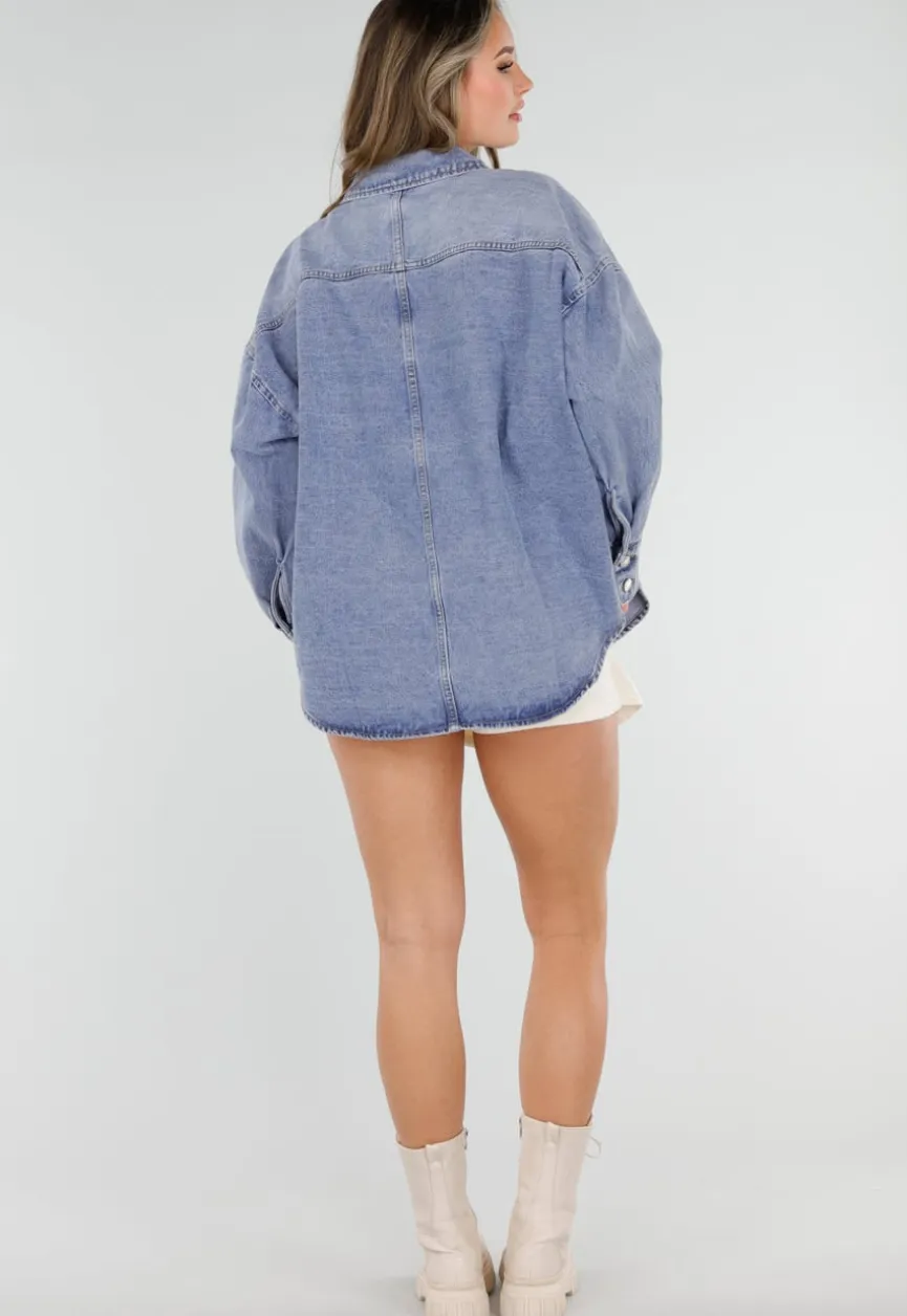 Blauwe Denim Blouse met Oversized Knopen en Lange Mouwen