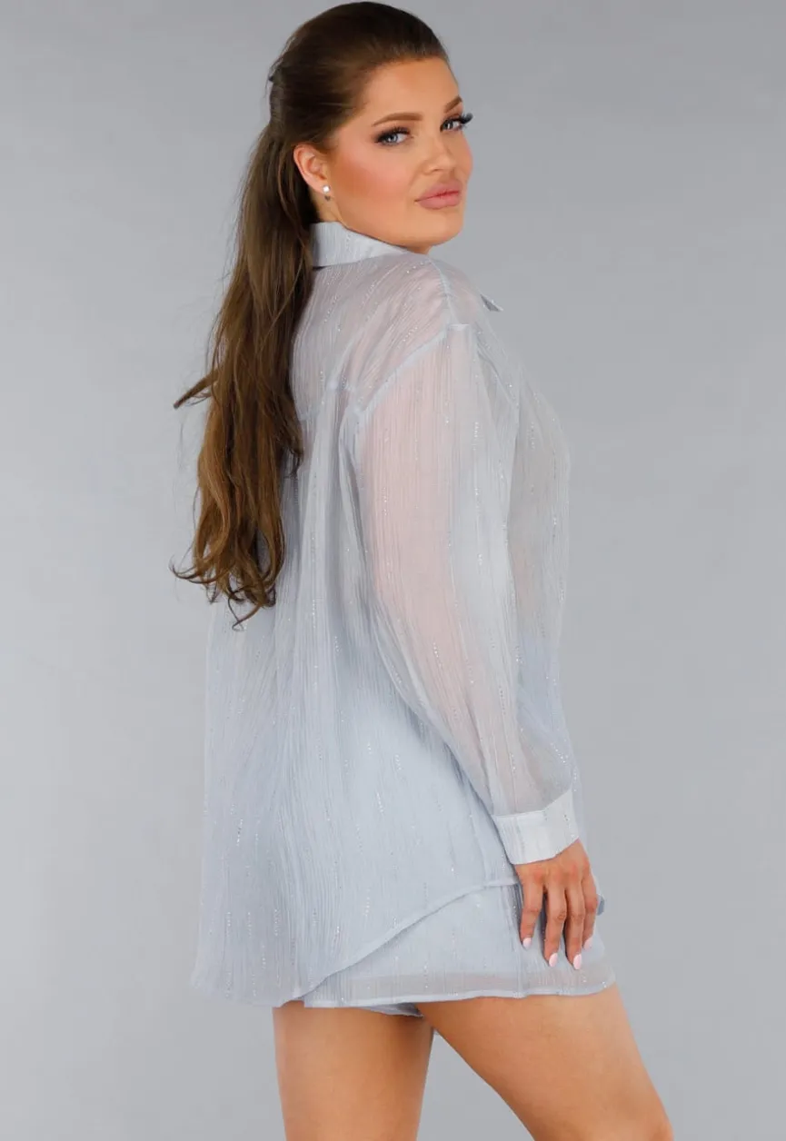 Blauwe Tweedelige Set met Doorschijnende Blouse en Elastische Short