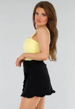 Butter Yellow Bodysuit met Brede Bandjes en V-Halsdetail