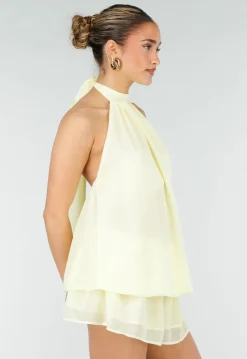 Butter Yellow Halter Jurk met Gelaagde Rok en Open Rug