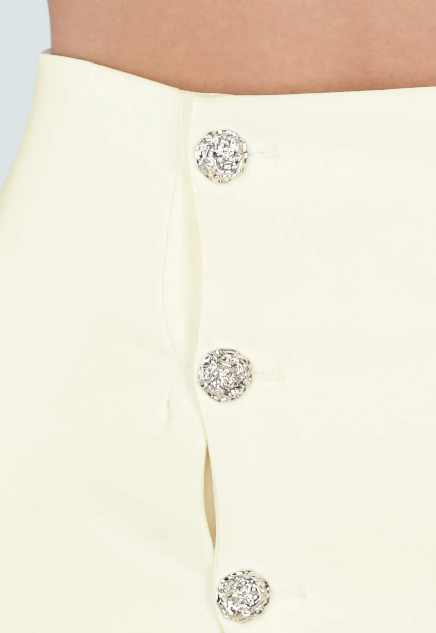 Butter Yellow Mini Rok met Overslag en Goudkleurige Knopen aan Voorkant