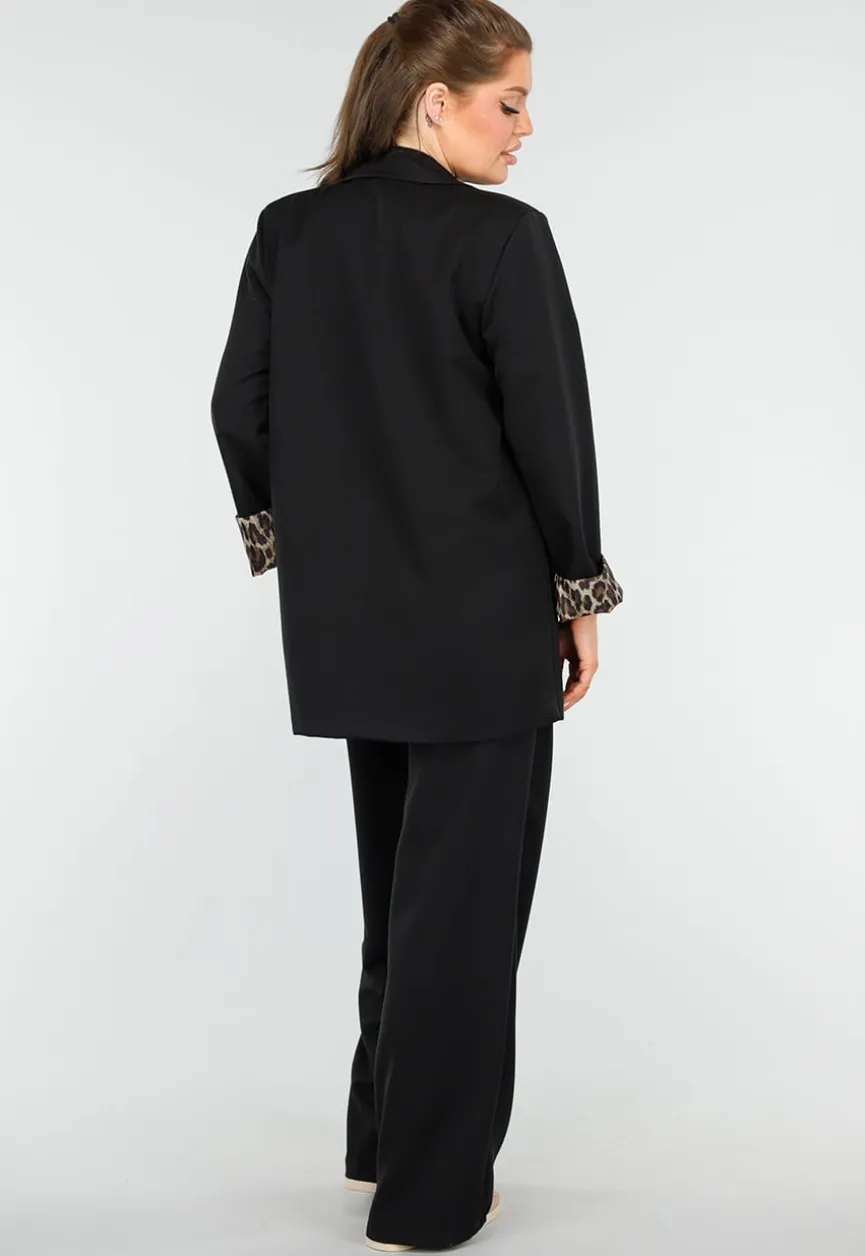 Elegant Zwart Pak met Leopardprint Accenten