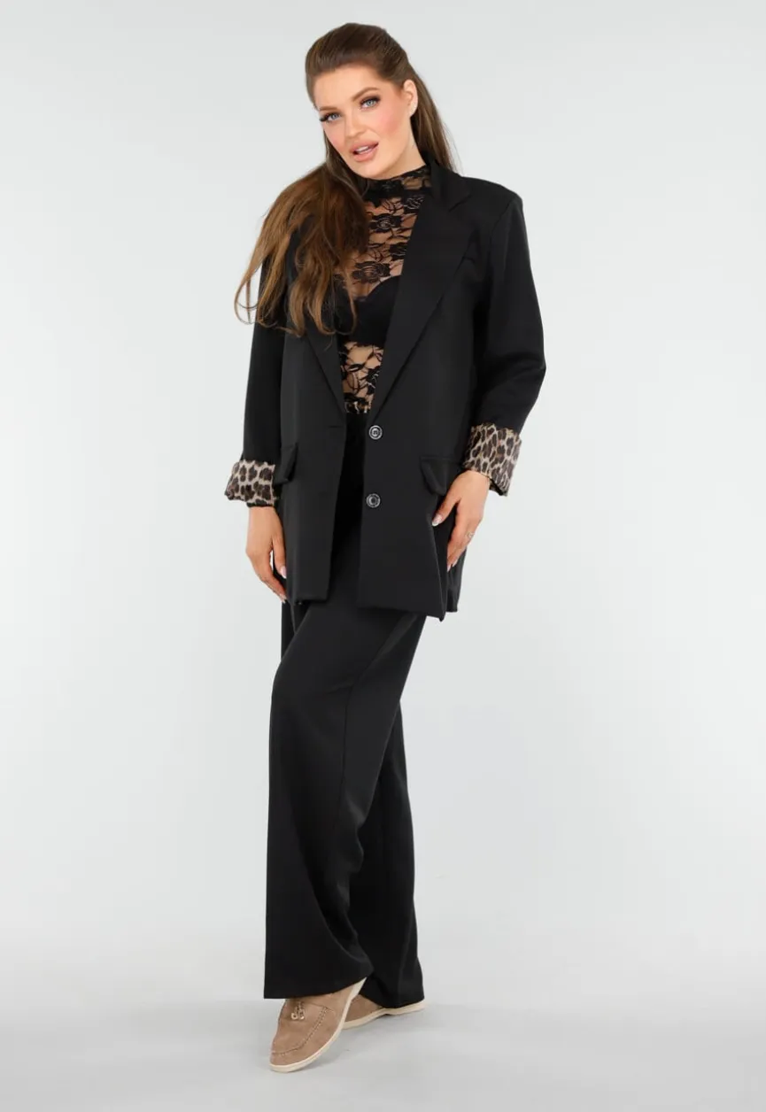 Elegant Zwart Pak met Leopardprint Accenten