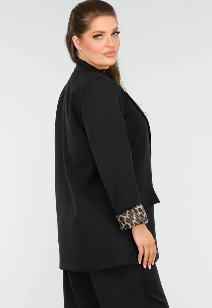 Elegant Zwart Pak met Leopardprint Accenten
