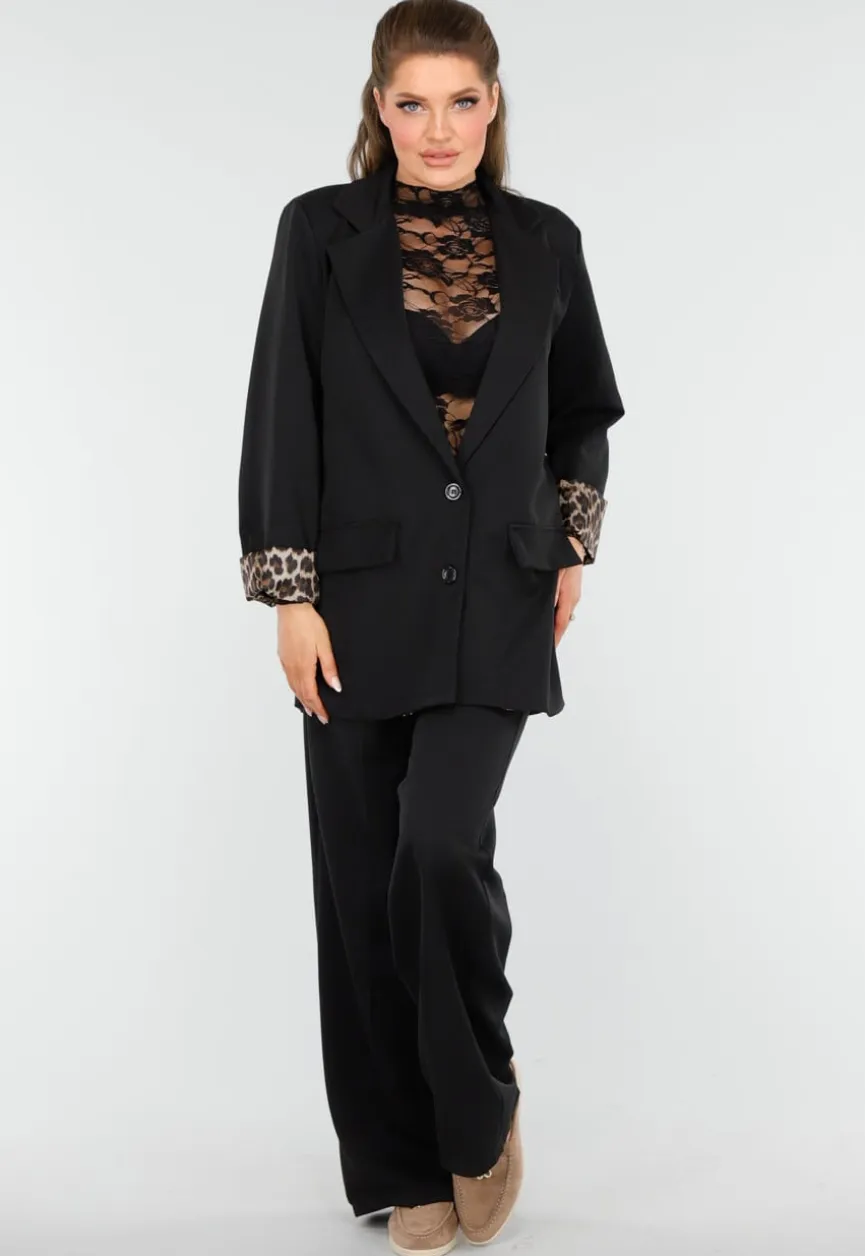 Elegant Zwart Pak met Leopardprint Accenten