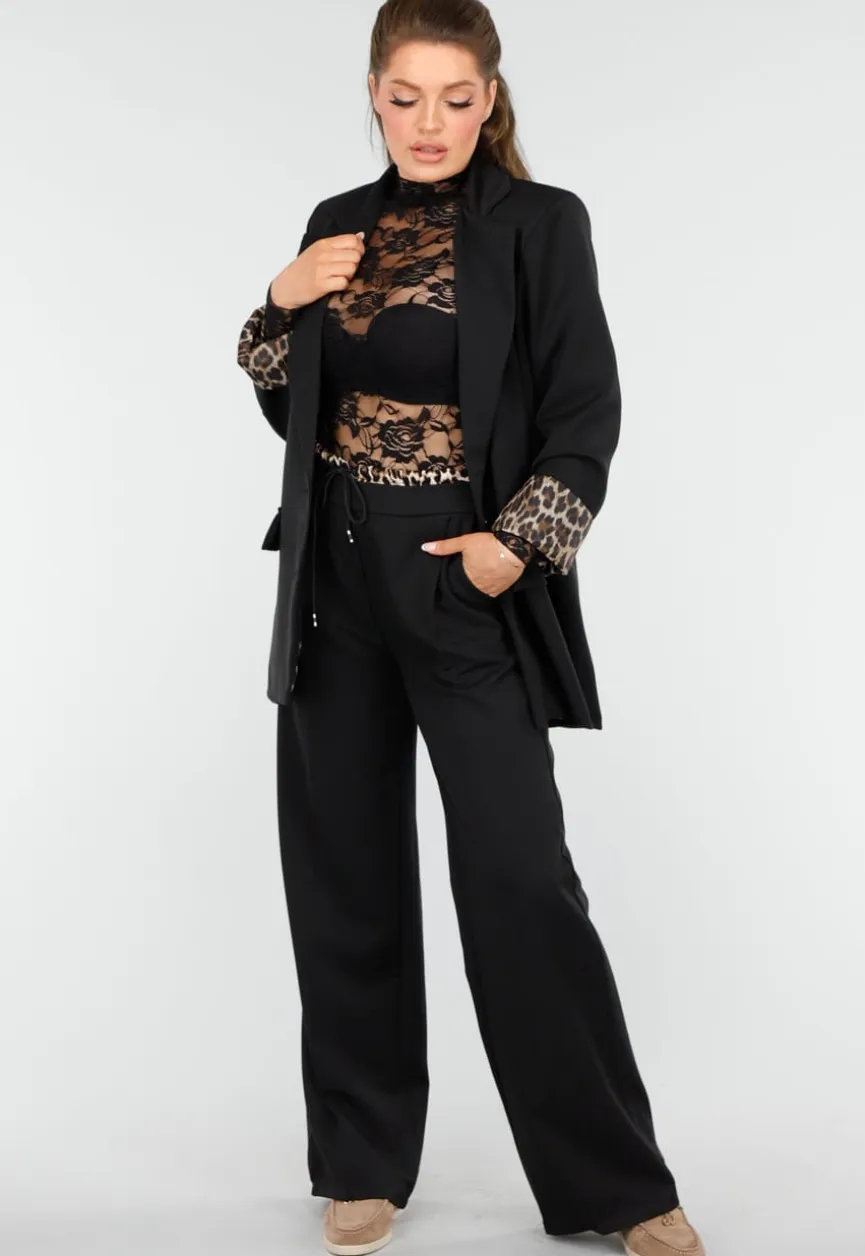 Elegant Zwart Pak met Leopardprint Accenten