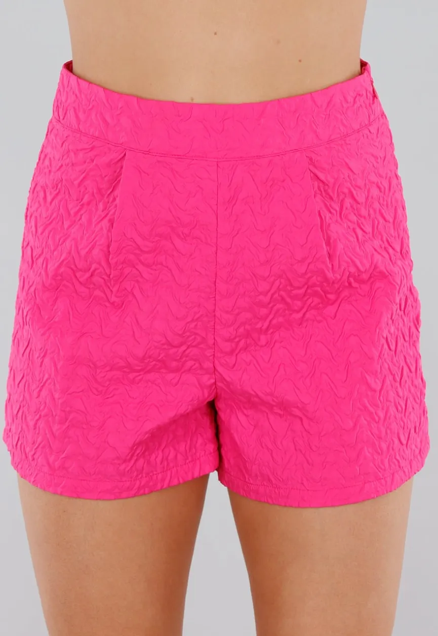 felroze Set met Gilet Top, Korte Broek en Golftextuur