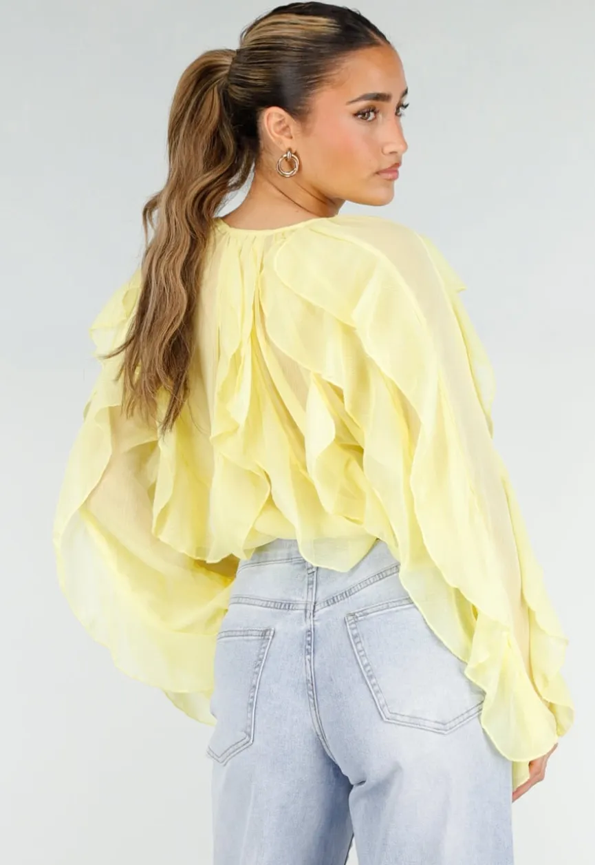 Gele Chiffon Blouse met Ruffles Lange Mouwen en Knopen
