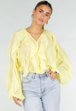 Gele Chiffon Blouse met Ruffles Lange Mouwen en Knopen