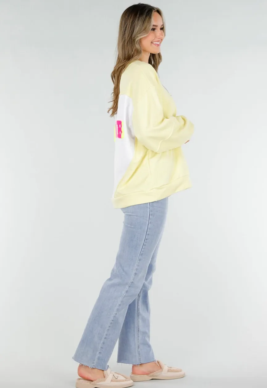 Gele Sweater met Good Vibes Print op Rug