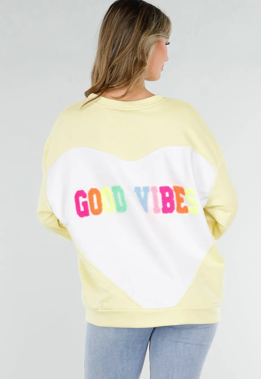 Gele Sweater met Good Vibes Print op Rug