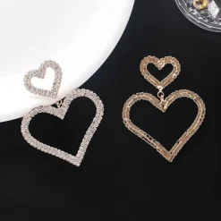 Gouden Glitter Hartjes Oorbellen