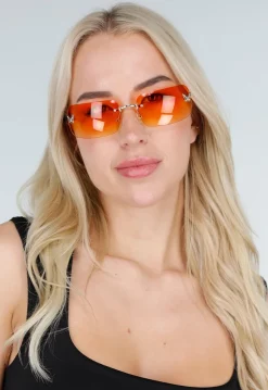 Goudkleurige Rechthoekige Zonnebril met Oranje Gradient Glazen en Metaal Frame