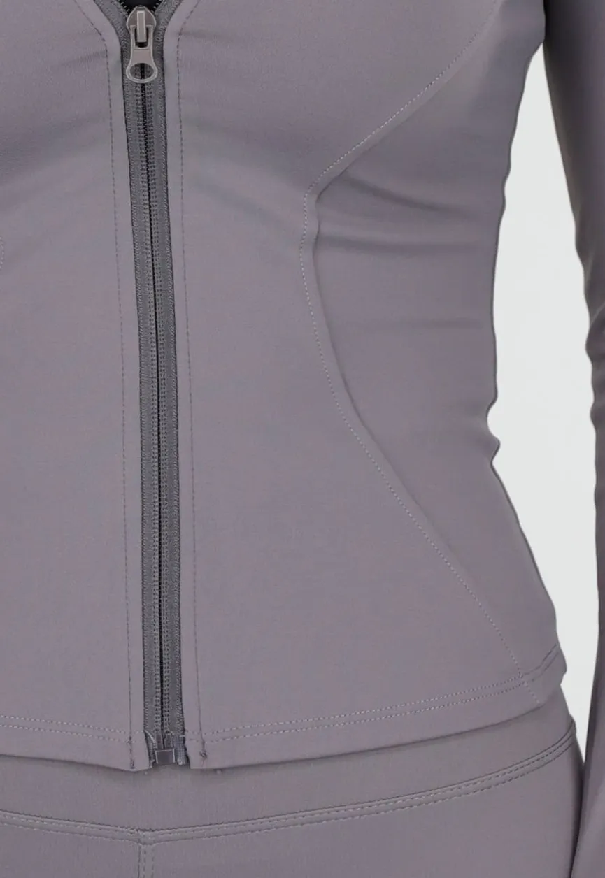 Grijze Stretch Sportset met Strakke Legging en Vestje