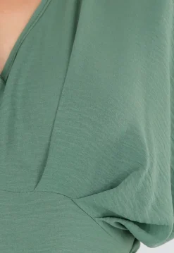 Groene Wijde Jumpsuit met V-Hals en Striksluiting op de Rug