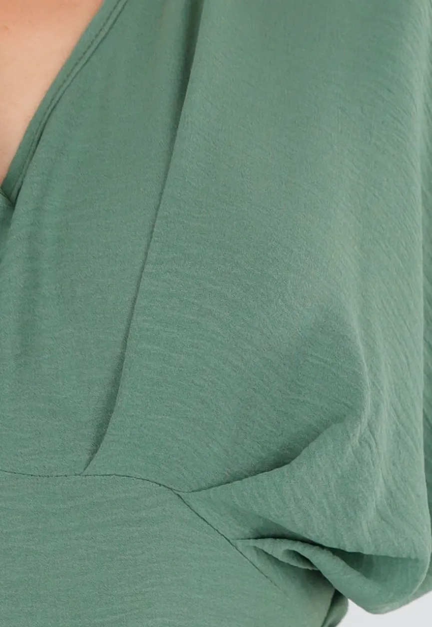Groene Wijde Jumpsuit met V-Hals en Striksluiting op de Rug