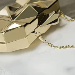 Kleine Metallic Clutch