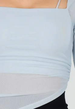 Lichtblauwe Asymmetrische Mesh Top met Lange Mouwen en Pads