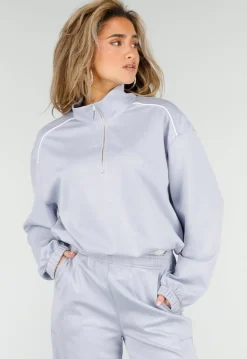 Lichtblauwe Sweater met Halve Rits en Elastische Boorden