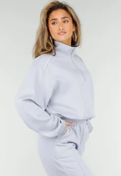 Lichtblauwe Sweater met Halve Rits en Elastische Boorden