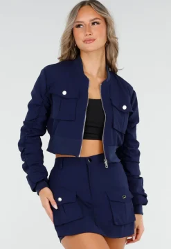 Navy Set met Cropped Bomberjasje en Skort met Zakken