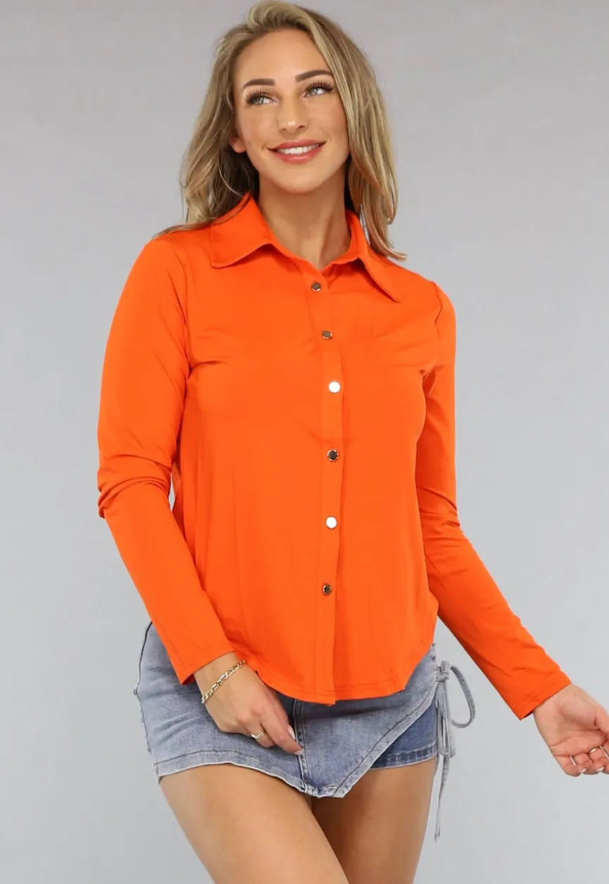 Oranje Blouse met Gouden Knopen