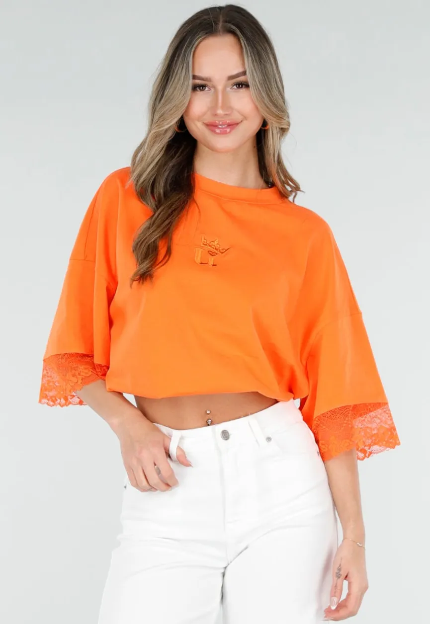 Oranje Oversized T-Shirt met Borduursel en Kanten Mouwen