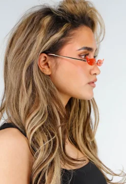 Oranje Randloze Cat Eye Zonnebril met Smalle Getinte Glazen