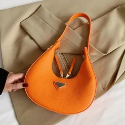 Ronde Oranje Lederlook Tas