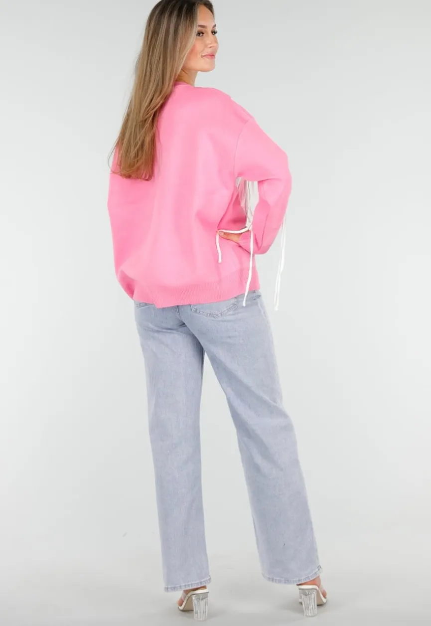 Roze Trui met Witte Hartprint en Franjes