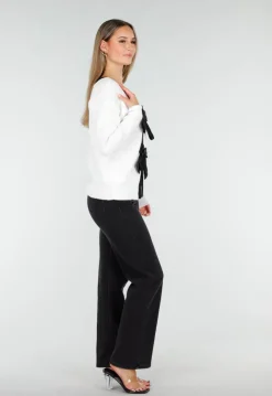 Witte Cardigan met Zwarte Strikken en Lange Mouwen