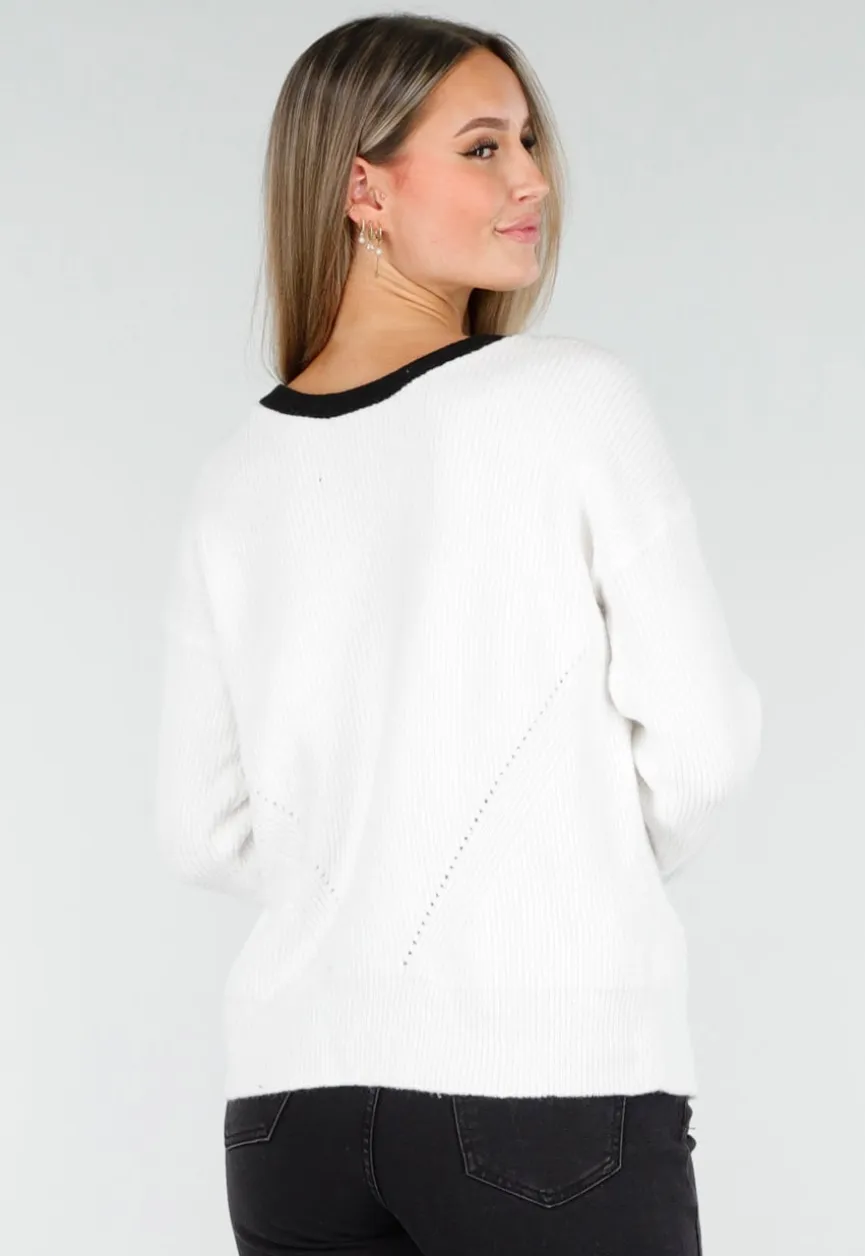 Witte Cardigan met Zwarte Strikken en Lange Mouwen
