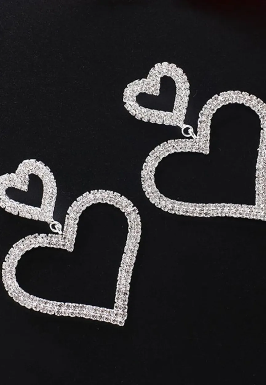 Zilveren Glitter Hartjes Oorbellen