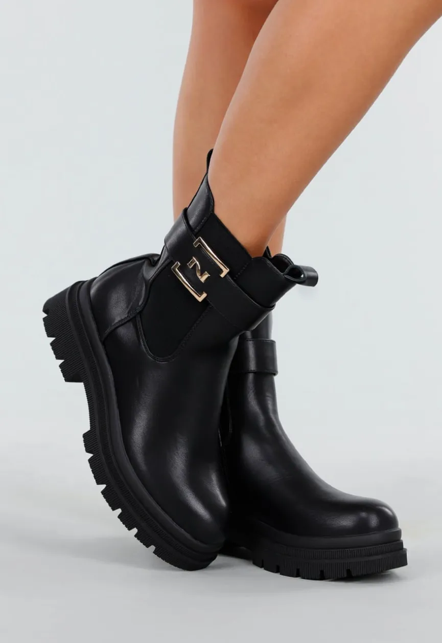 Zwarte Enkelboots met Chunky Zool Rits en Goudkleurige Gesp