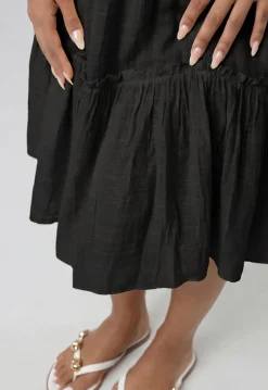 Zwarte Mousseline Mini Jurk met V-Hals en Volantzoom