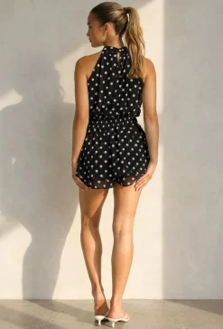 Zwarte Polkadot Playsuit met Halterhals en Volantlaag