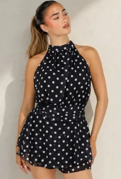 Zwarte Polkadot Playsuit met Halterhals en Volantlaag