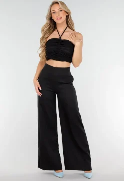 Zwarte Set met Halter Crop Top en Wijde High Waist Broek