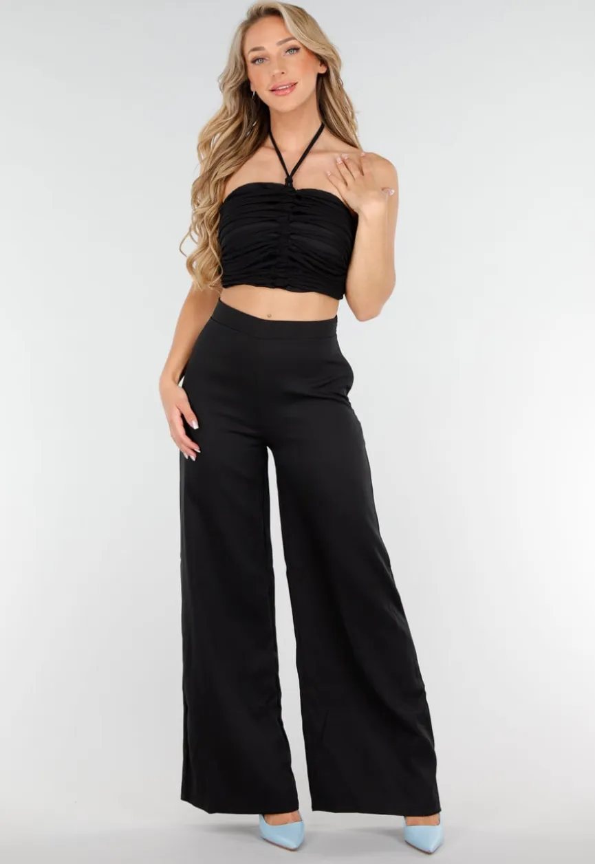 Zwarte Set met Halter Crop Top en Wijde High Waist Broek