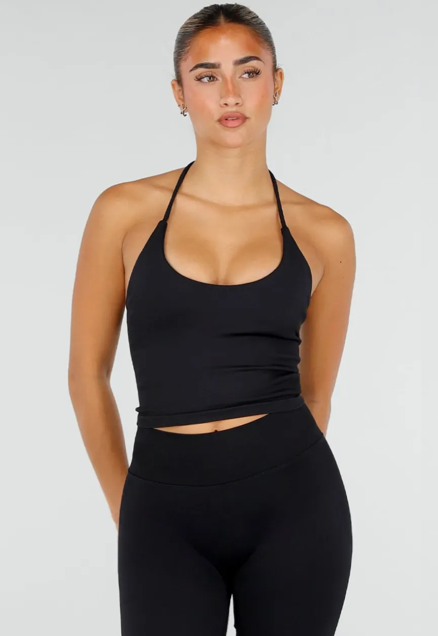 Zwarte Sportset met Halter Top, Flared Legging en Uitneembare Pads