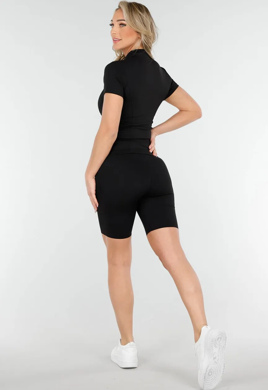 Zwarte Sportset met Korte Mouwen Jasje, High-Waist Short en Corrigerende Band