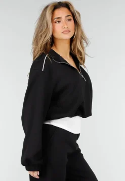 Zwarte Sweater met Halve Rits en Elastische Boorden