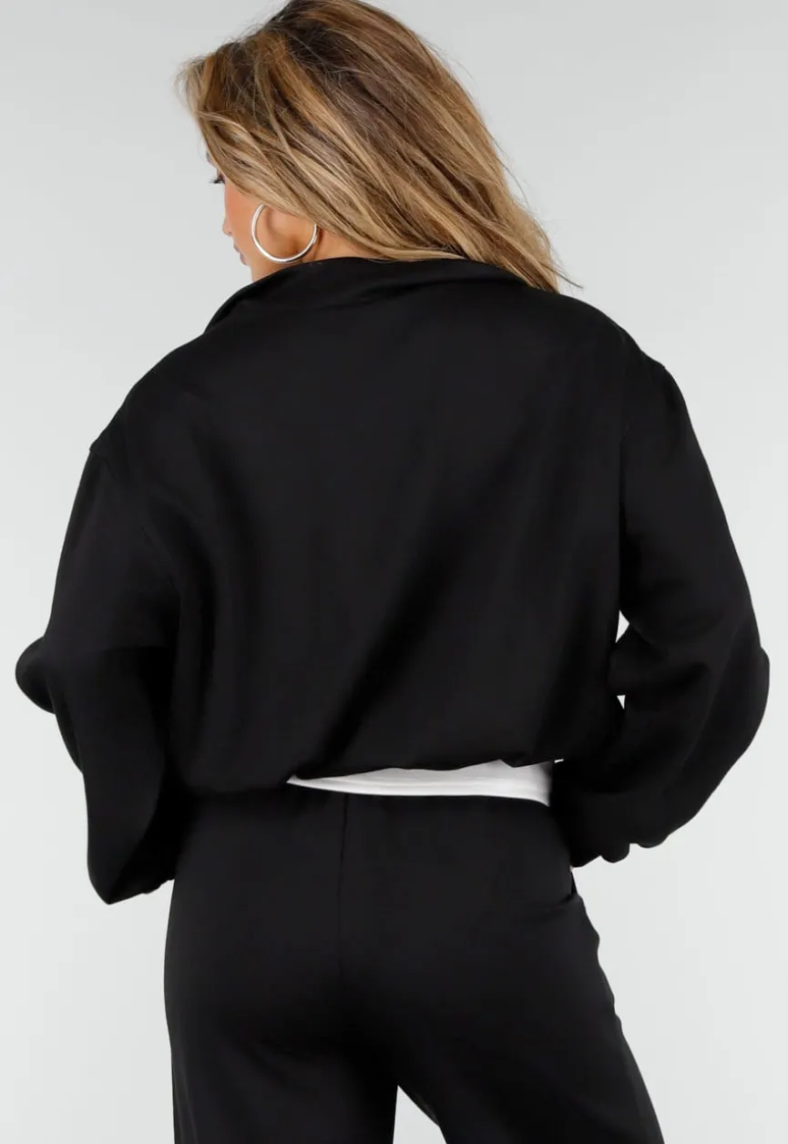 Zwarte Sweater met Halve Rits en Elastische Boorden