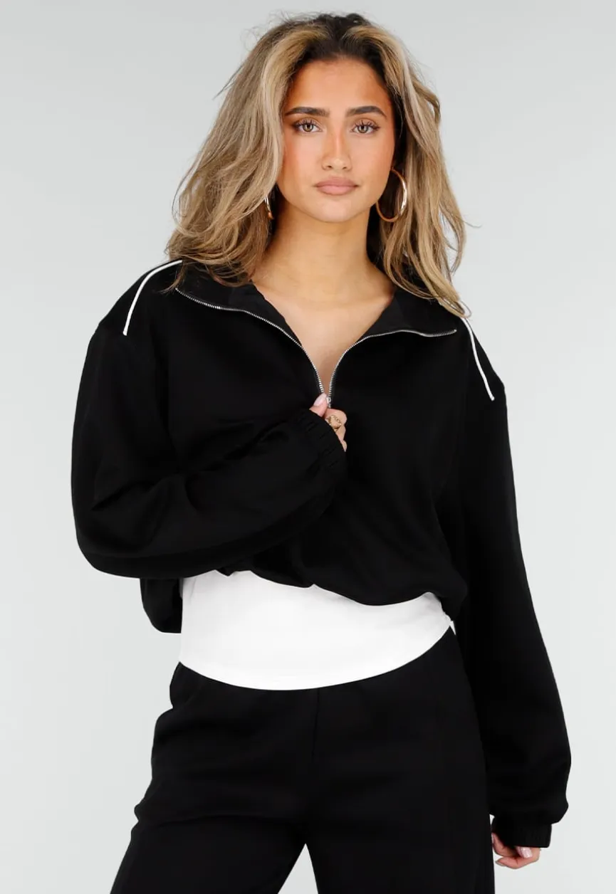 Zwarte Sweater met Halve Rits en Elastische Boorden